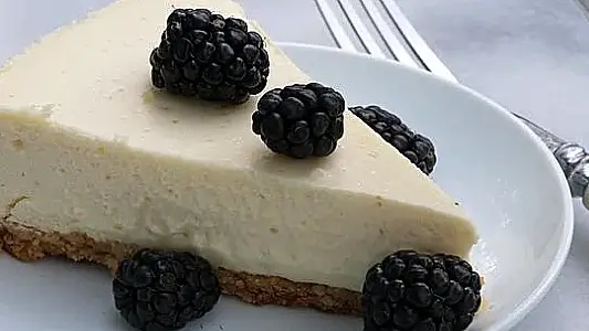 Almond Flour Crust Cheesecake covered in blueberries