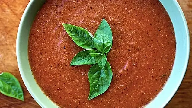 Tomato basil soup served in bowl